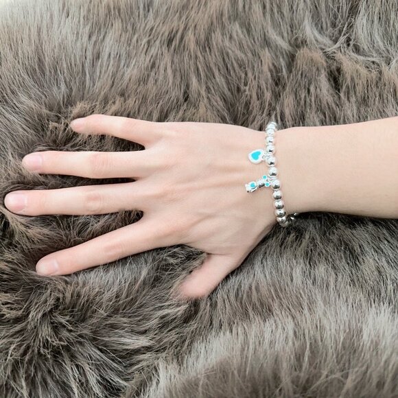 Tiffany & Co. Silver Charm Bracelet with Heart and Key